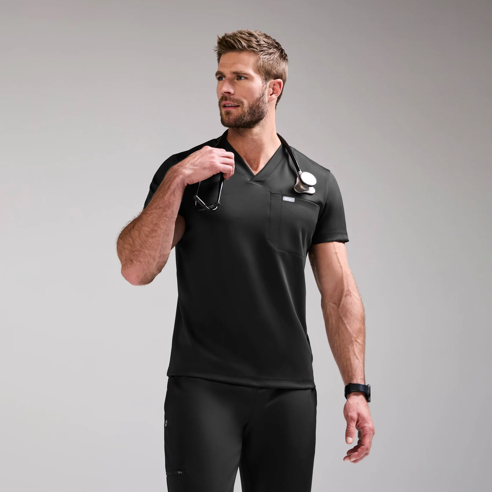 1039-men-s-black-logan-formx-slim-v-neck-scrub-toptm-1.webp men's Black Logan FORMx Slim V-Neck - Scrub Top™